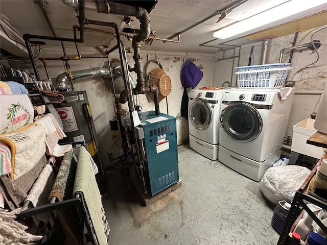 65 Stephen Pl, Valley Stream, NY 11580 - unfinished below grade area featuring washer and clothes dryer, gas water heater, and a heating unit
