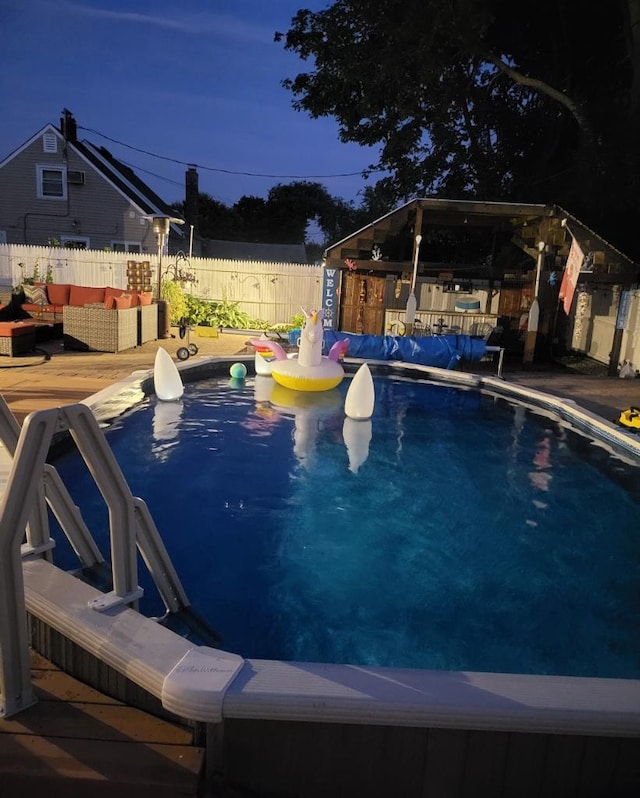 28 Crabtree Ln, Levittown, NY 11756 - view of pool featuring an outdoor hangout area and a gazebo