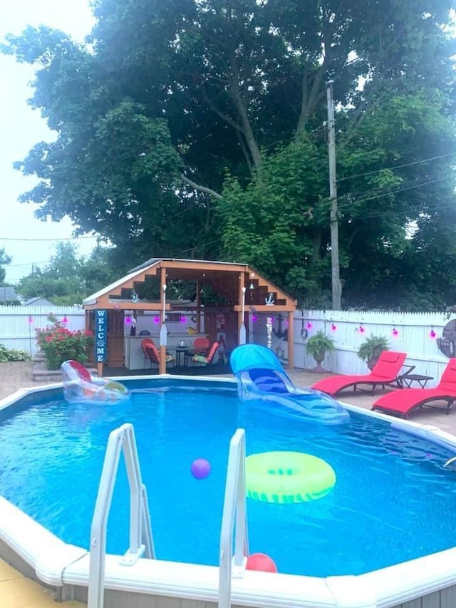 28 Crabtree Ln, Levittown, NY 11756 - view of swimming pool featuring a fenced backyard