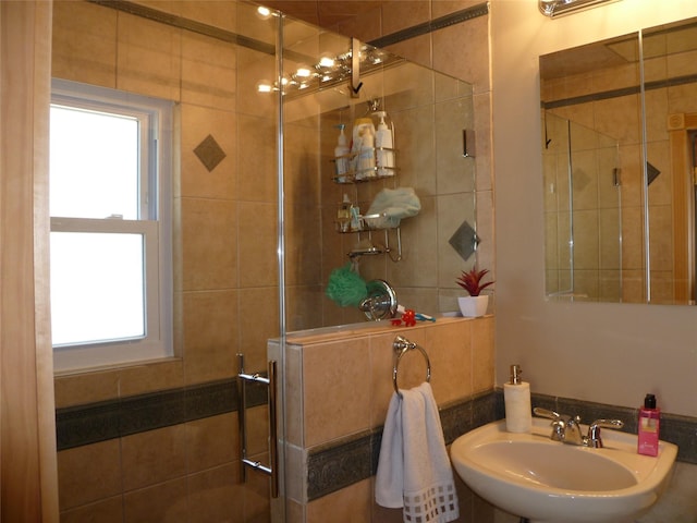 28 Crabtree Ln, Levittown, NY 11756 - bathroom featuring a sink and a shower stall