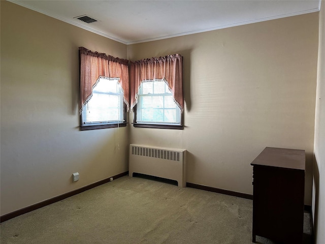 929 White Birch Ln, Wantagh, NY 11793 - spare room with radiator, light colored carpet, crown molding, and baseboards