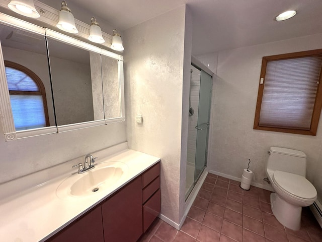 61 John St, Port Jefferson Station, NY 11776 - bathroom with vanity, a stall shower, tile patterned floors, toilet, and baseboards