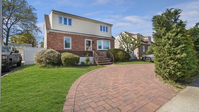 1434 Noel Ave, Hewlett, NY 11557 - view of front of home with brick siding and decorative driveway