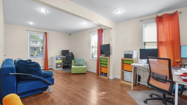 1434 Noel Ave, Hewlett, NY 11557 - office space featuring wood finished floors, healthy amount of natural light, a baseboard heating unit, baseboards, and recessed lighting