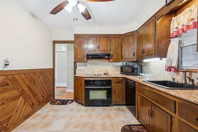 624 Westminster Rd, Baldwin, NY 11510 - kitchen with black appliances, a sink, ceiling fan, under cabinet range hood, and backsplash