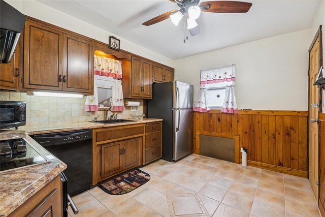 624 Westminster Rd, Baldwin, NY 11510 - kitchen with black appliances, a sink, a ceiling fan, extractor fan, and backsplash