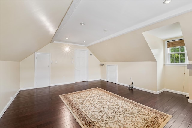624 Westminster Rd, Baldwin, NY 11510 - bonus room featuring dark wood-type flooring, baseboards, and lofted ceiling