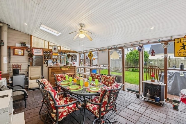 624 Westminster Rd, Baldwin, NY 11510 - sunroom / solarium featuring a wood stove and vaulted ceiling