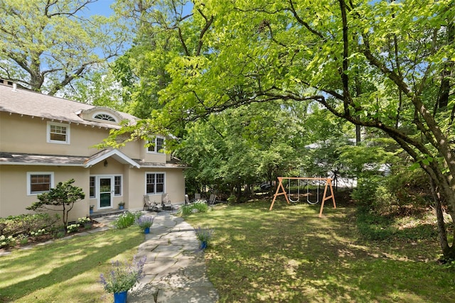 7 Ravine Dr, Hastings-On-Hudson, NY 10706 - view of grassy yard with a playground