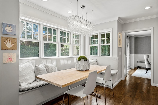 68 Greenhaven Rd, Rye, NY 10580 - dining space with breakfast area, ornamental molding, dark wood-type flooring, radiator, and a chandelier
