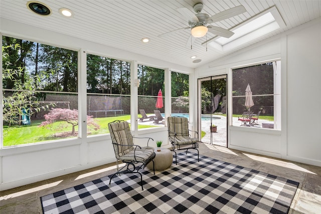 68 Greenhaven Rd, Rye, NY 10580 - sunroom featuring healthy amount of natural light, ceiling fan, vaulted ceiling, and a skylight