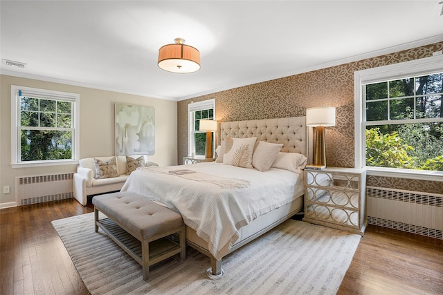 68 Greenhaven Rd, Rye, NY 10580 - bedroom with radiator heating unit, wallpapered walls, crown molding, and wood-type flooring