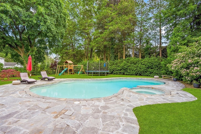 68 Greenhaven Rd, Rye, NY 10580 - view of swimming pool with a playground, a patio, a yard, and view of wooded area