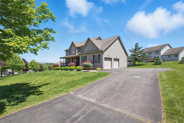 15 Prestwick Dr, Monroe, NY 10950 - traditional-style house featuring driveway and a front yard