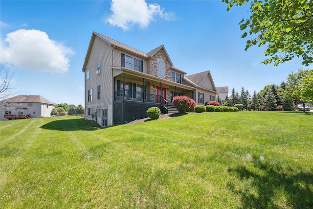 15 Prestwick Dr, Monroe, NY 10950 - back of house with covered porch and a yard