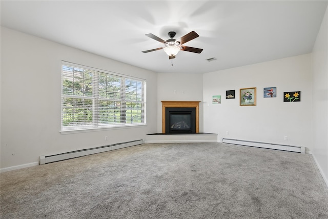 15 Prestwick Dr, Monroe, NY 10950 - unfurnished living room featuring baseboard heating, a baseboard heating unit, a ceiling fan, and carpet floors