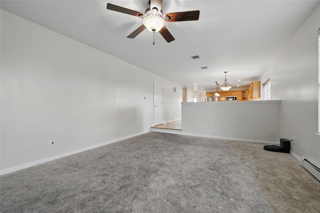 15 Prestwick Dr, Monroe, NY 10950 - unfurnished living room with a ceiling fan, carpet floors, baseboards, a baseboard radiator, and recessed lighting