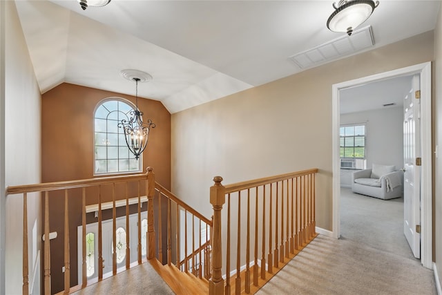 15 Prestwick Dr, Monroe, NY 10950 - hall with an upstairs landing, a chandelier, carpet floors, lofted ceiling, and baseboards