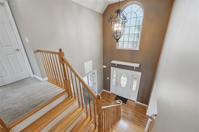 15 Prestwick Dr, Monroe, NY 10950 - foyer with a chandelier, healthy amount of natural light, high vaulted ceiling, wood finished floors, and baseboards