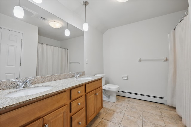 15 Prestwick Dr, Monroe, NY 10950 - bathroom featuring baseboard heating, double vanity, toilet, and tile patterned floors