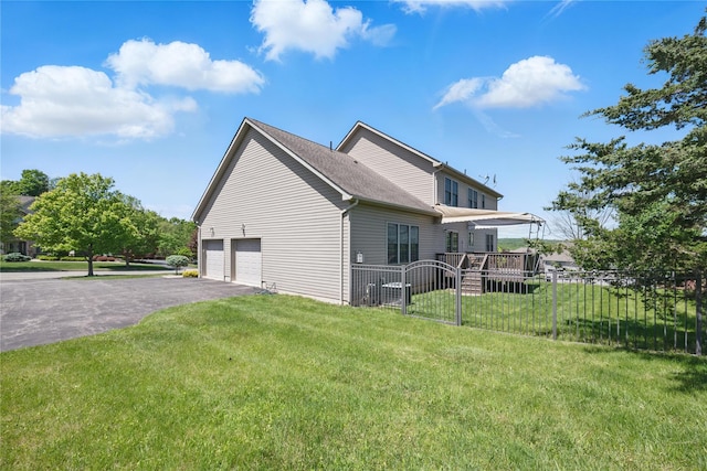 15 Prestwick Dr, Monroe, NY 10950 - view of property exterior featuring asphalt driveway and an attached garage