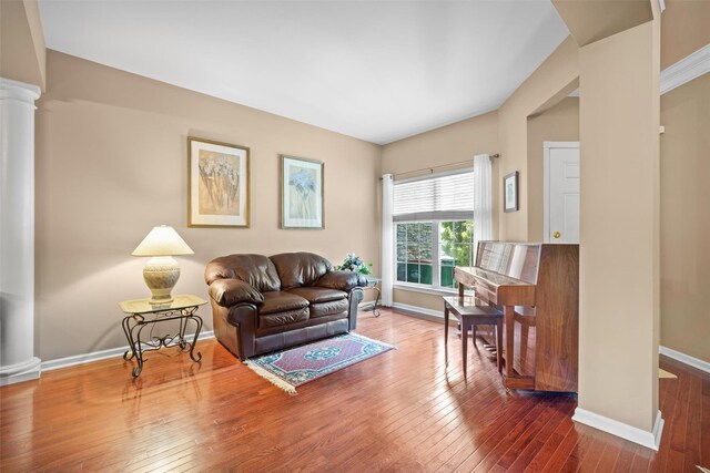 837 Huntington Dr Unit 152, Fishkill, NY 12524 - living area featuring decorative columns, hardwood / wood-style flooring, and baseboards