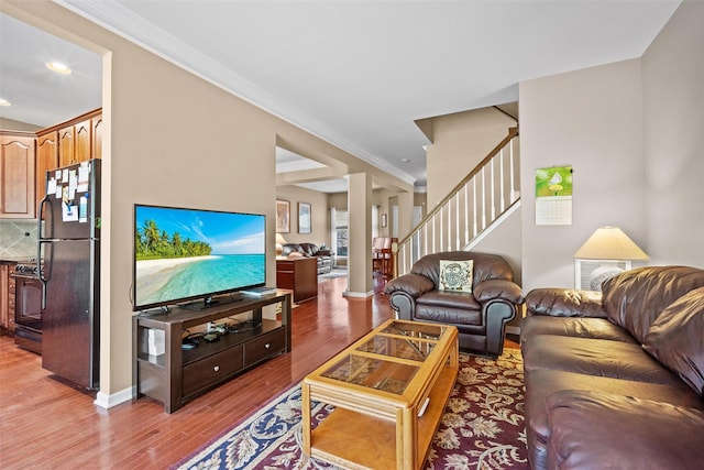 837 Huntington Dr Unit 152, Fishkill, NY 12524 - living room with wood finished floors, stairway, ornamental molding, recessed lighting, and baseboards