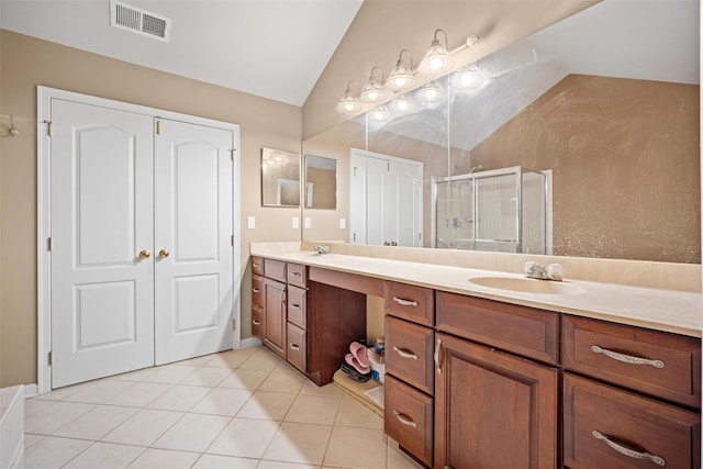 837 Huntington Dr Unit 152, Fishkill, NY 12524 - full bath with double vanity, a shower stall, lofted ceiling, and tile patterned floors