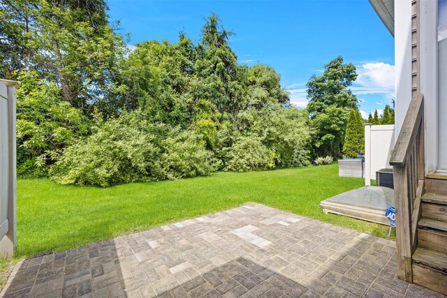 837 Huntington Dr Unit 152, Fishkill, NY 12524 - view of green lawn featuring a patio area