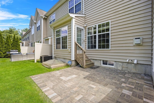 837 Huntington Dr Unit 152, Fishkill, NY 12524 - rear view of property with entry steps, a patio area, and cooling unit