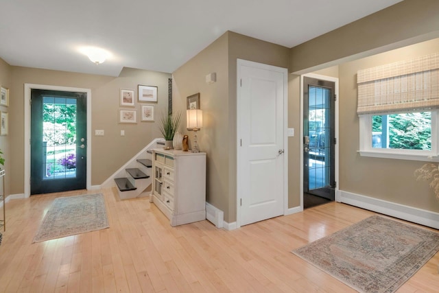 416 Sleepy Hollow Rd, Briarcliff Manor, NY 10510 - entryway featuring light wood-type flooring, baseboards, and stairway