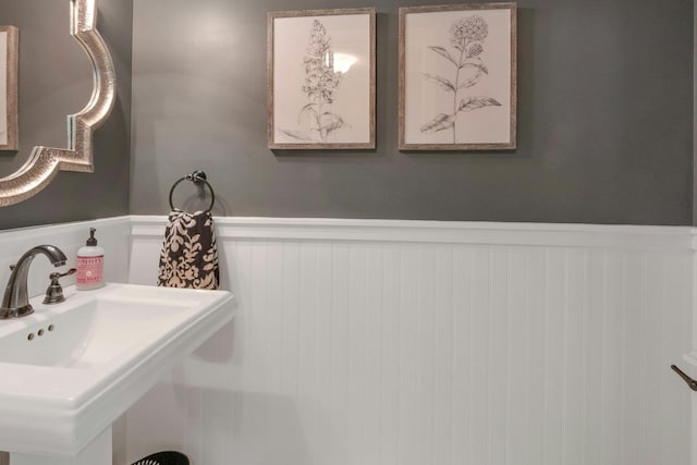 416 Sleepy Hollow Rd, Briarcliff Manor, NY 10510 - bathroom with wainscoting and a sink