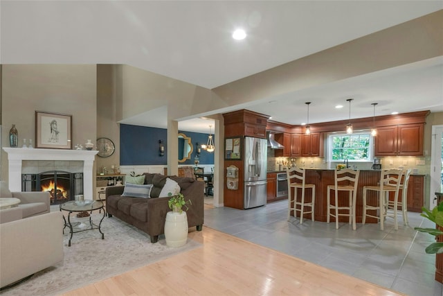 416 Sleepy Hollow Rd, Briarcliff Manor, NY 10510 - living room with light wood-style flooring, a fireplace, and recessed lighting