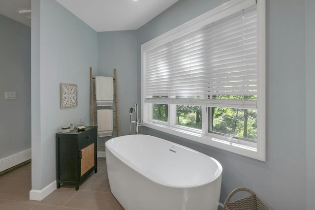 416 Sleepy Hollow Rd, Briarcliff Manor, NY 10510 - full bath featuring a soaking tub, baseboards, and tile patterned floors