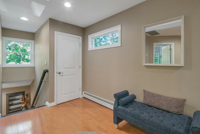 416 Sleepy Hollow Rd, Briarcliff Manor, NY 10510 - living area with a baseboard radiator, an upstairs landing, healthy amount of natural light, light wood-style floors, and recessed lighting