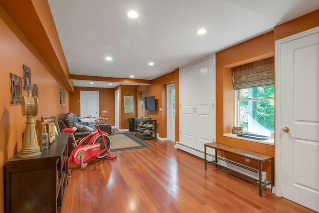 416 Sleepy Hollow Rd, Briarcliff Manor, NY 10510 - living area featuring baseboard heating, recessed lighting, wood finished floors, and baseboards