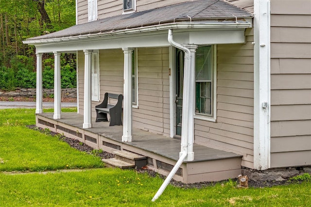 1 Green St, Gilbertsville, NY 13776 - view of property exterior with a porch, roof with shingles, and a yard