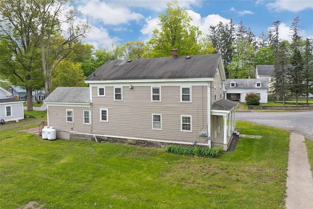 1 Green St, Gilbertsville, NY 13776 - view of property exterior with a chimney, a lawn, and roof with shingles