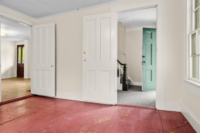 1 Green St, Gilbertsville, NY 13776 - unfurnished room featuring baseboards, stairway, and wood finished floors