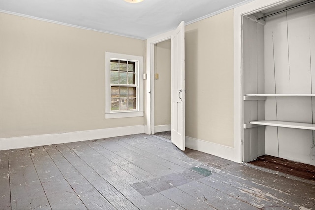 1 Green St, Gilbertsville, NY 13776 - unfurnished room featuring wood-type flooring, baseboards, and crown molding