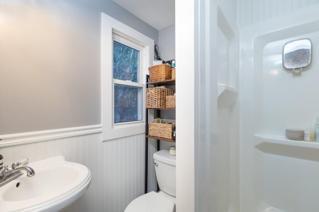 137C Shore Rd, Mount Sinai, NY 11766 - bathroom with a sink, a wainscoted wall, toilet, and a shower