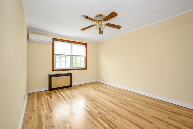 21-22 150th St, Whitestone, NY 11357 - empty room featuring a wall mounted AC, light wood-style flooring, baseboards, a ceiling fan, and crown molding
