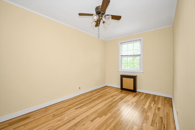 21-22 150th St, Whitestone, NY 11357 - empty room with baseboards, light wood-type flooring, crown molding, and a ceiling fan