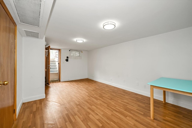 21-22 150th St, Whitestone, NY 11357 - below grade area featuring light wood finished floors and baseboards