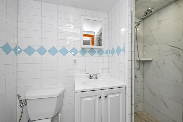 21-22 150th St, Whitestone, NY 11357 - full bathroom featuring a stall shower, vanity, toilet, and tile walls
