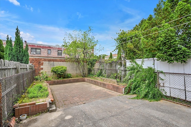 21-22 150th St, Whitestone, NY 11357 - fenced backyard with a patio