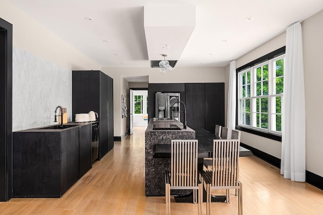 1015 Seven Oaks Ln, Mamaroneck, NY 10543 - dining room with light wood finished floors and baseboards