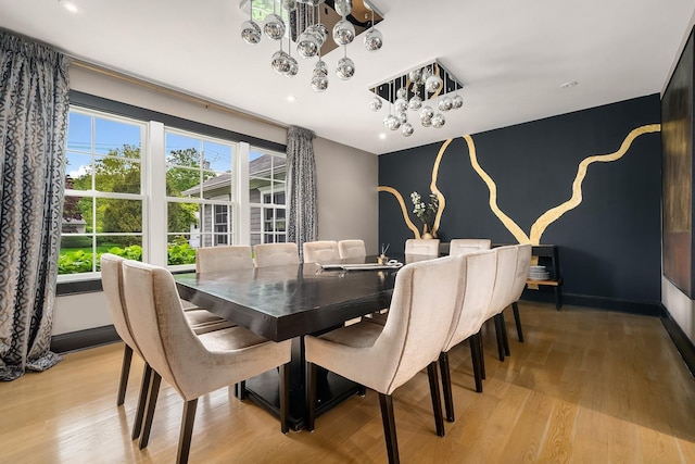 1015 Seven Oaks Ln, Mamaroneck, NY 10543 - dining room featuring a chandelier, light wood-type flooring, recessed lighting, and baseboards