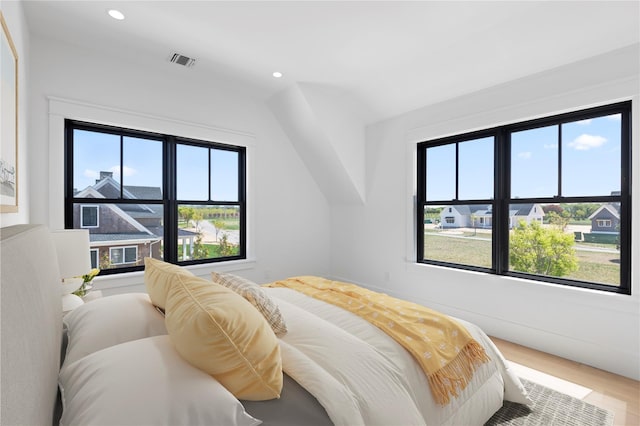 35 Club Dr, Baiting Hollow, NY 11933 - bedroom featuring recessed lighting, wood finished floors, and vaulted ceiling