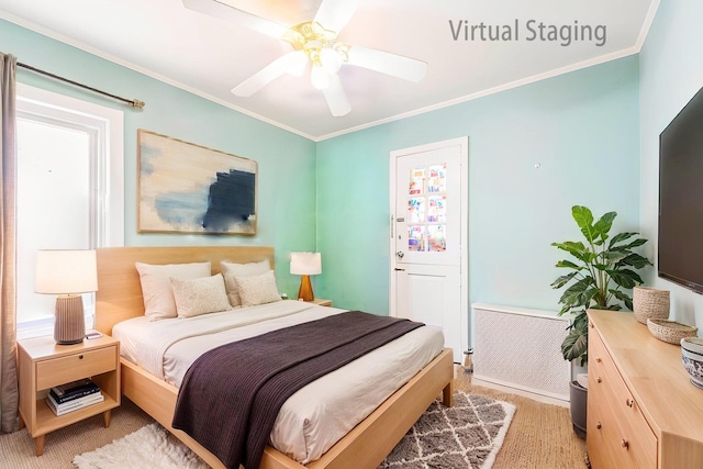 bedroom featuring ornamental molding and ceiling fan